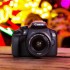 دوربین دیجیتال کانن مدل EOS 1300D همراه با لنز EF-S 18-55mm IS II
