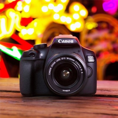 دوربین دیجیتال کانن مدل EOS 1300D همراه با لنز EF-S 18-55mm IS II